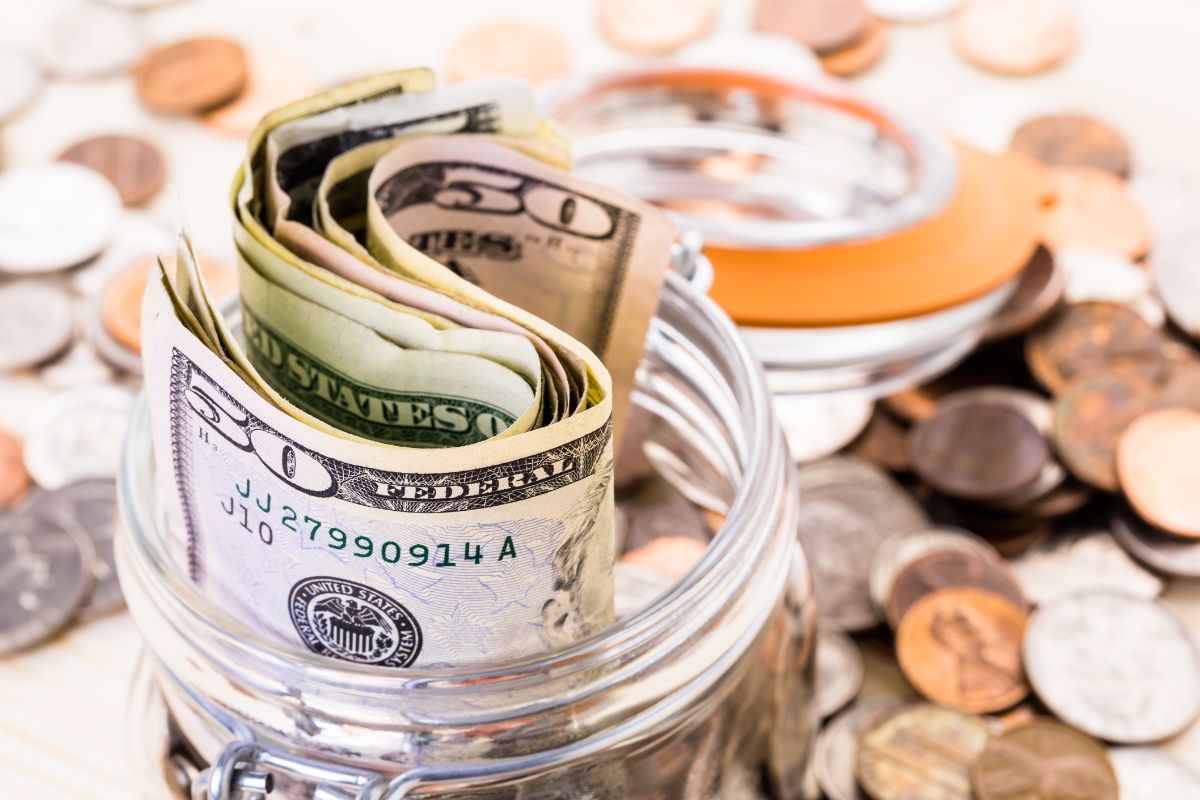 Picture of a jar of money for a savings challenge.