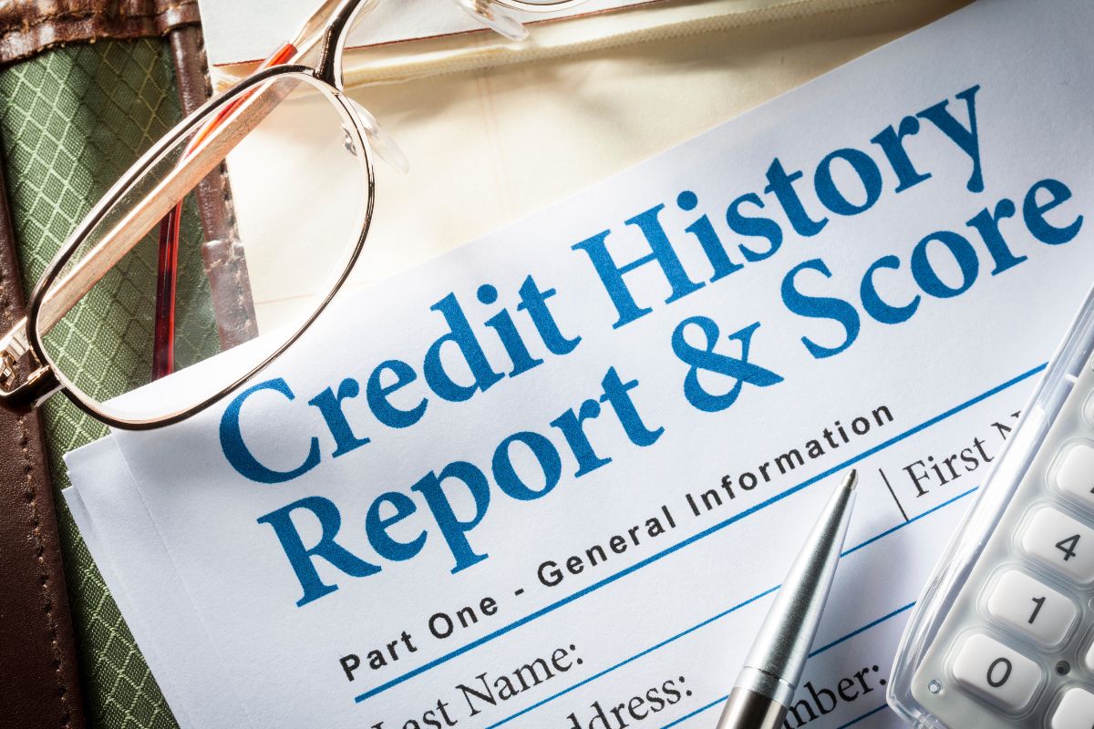 The photo shows a credit report.