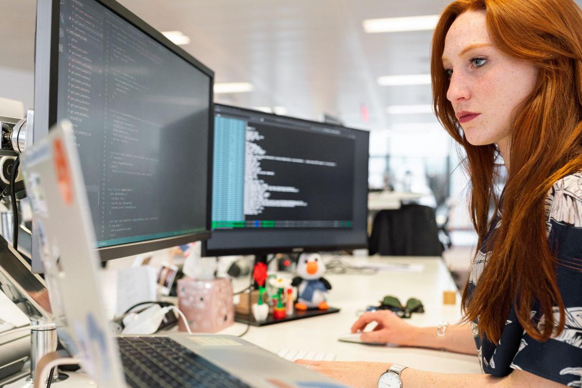 Picture of a woman coding.