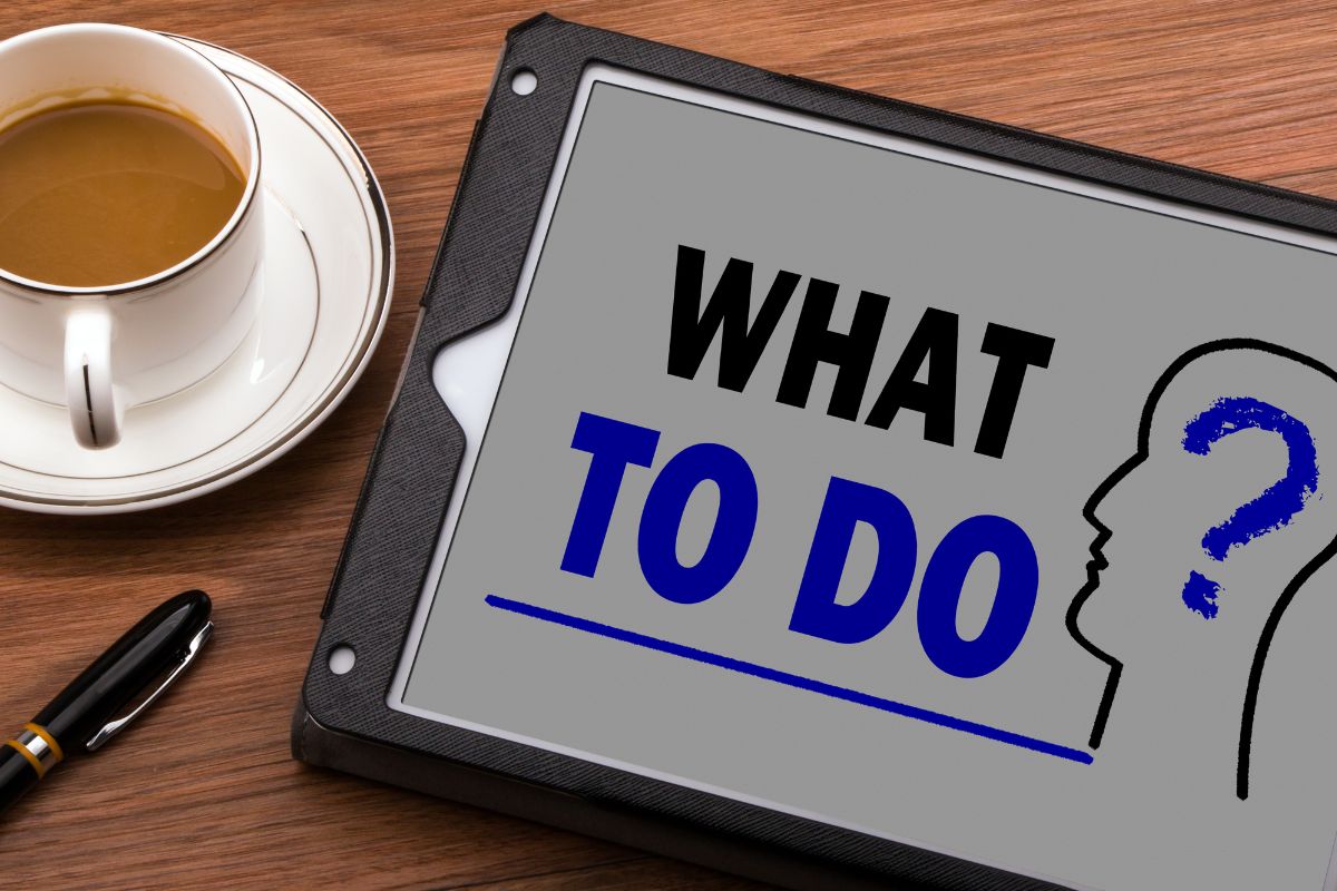 The photo shows a tablet device with what to do wording.