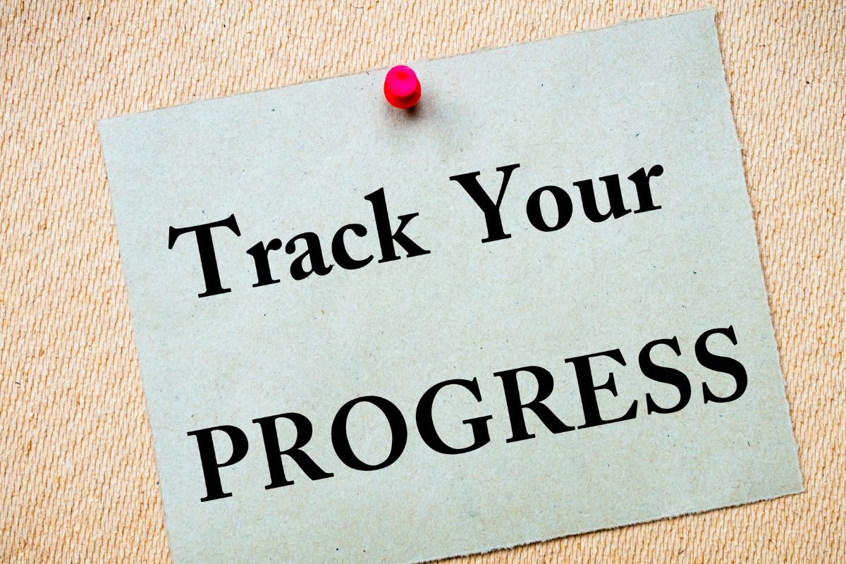 Image of a paper with track your progress wording.