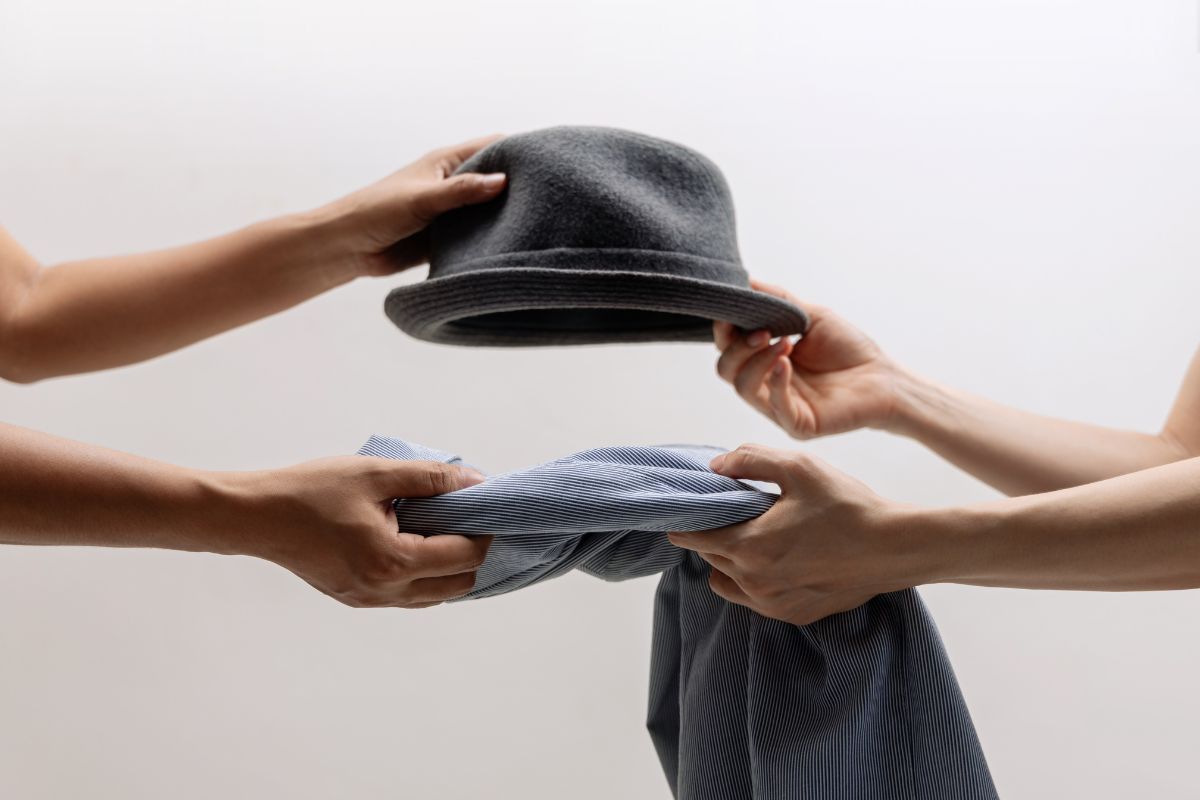 The photo shows women swapping items.