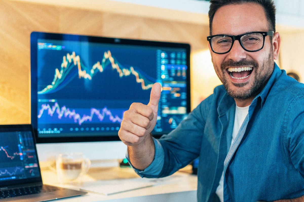 The photo of a man doing a day trade.