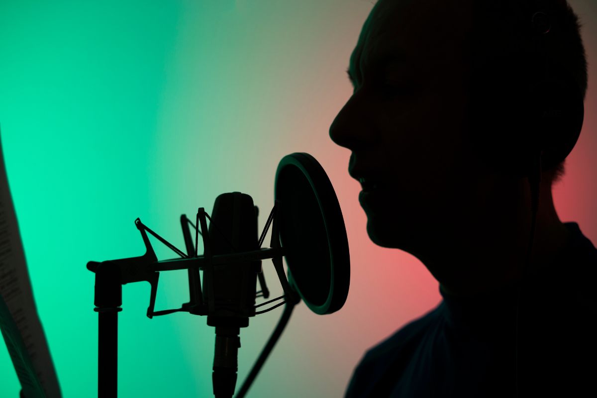 An image of a man doing a voiceover.