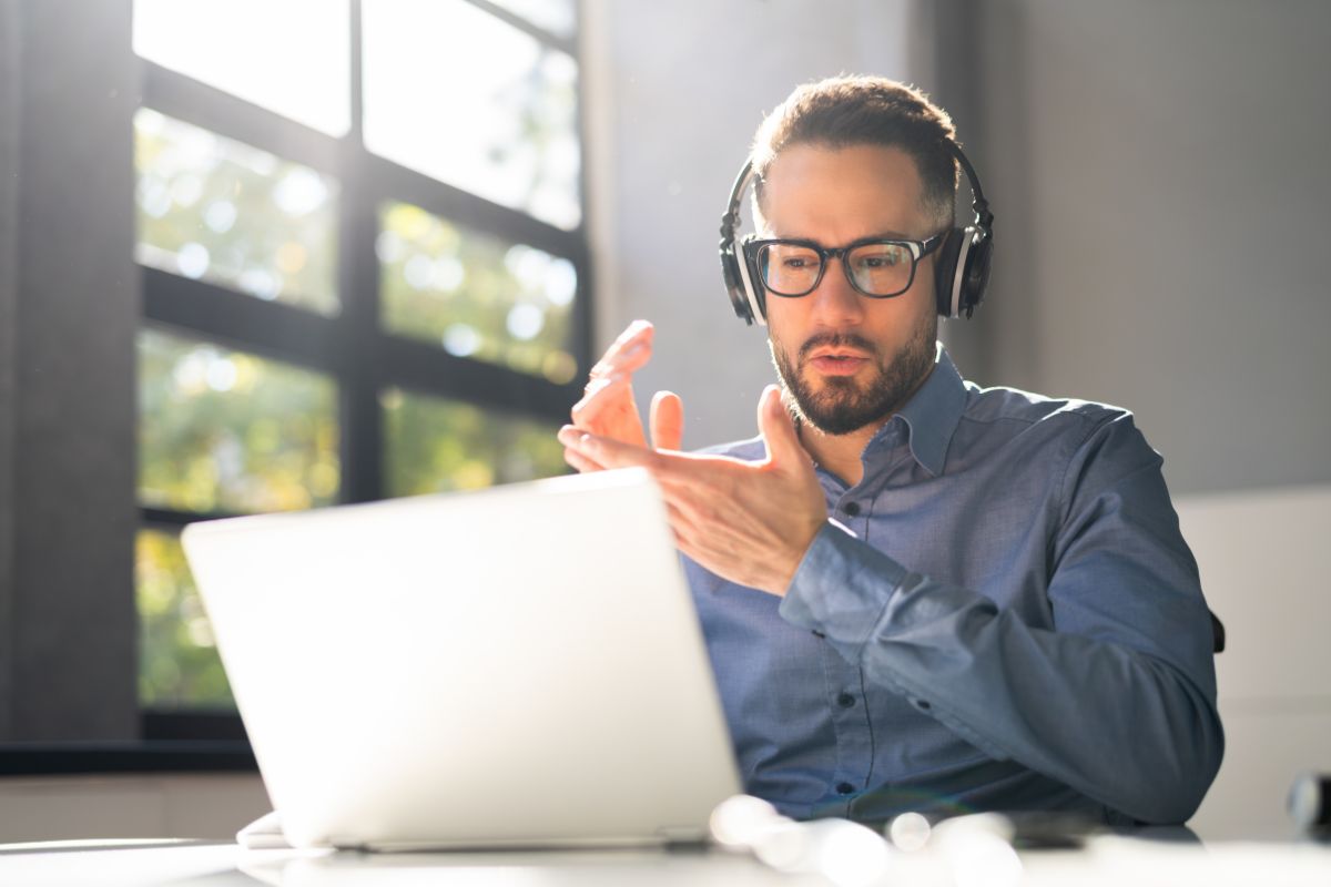 The image shows a man doing an online mock juror.