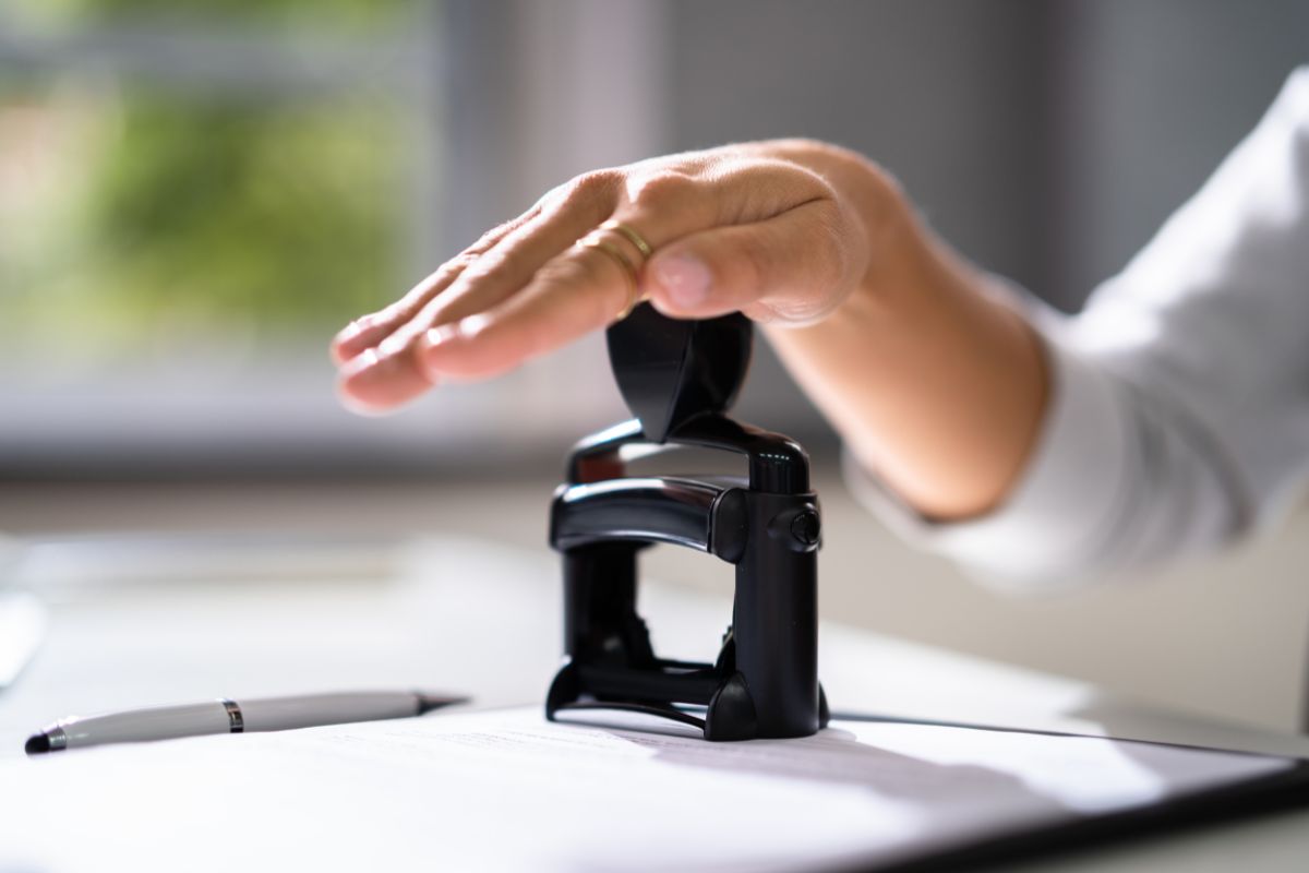 Picture of a man doing a notary.