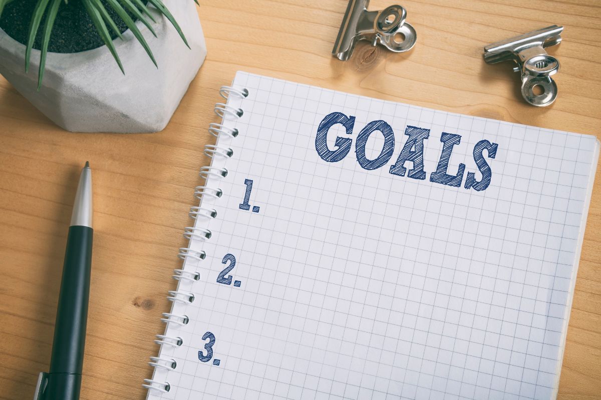 Photo of a notebook with goals written.
