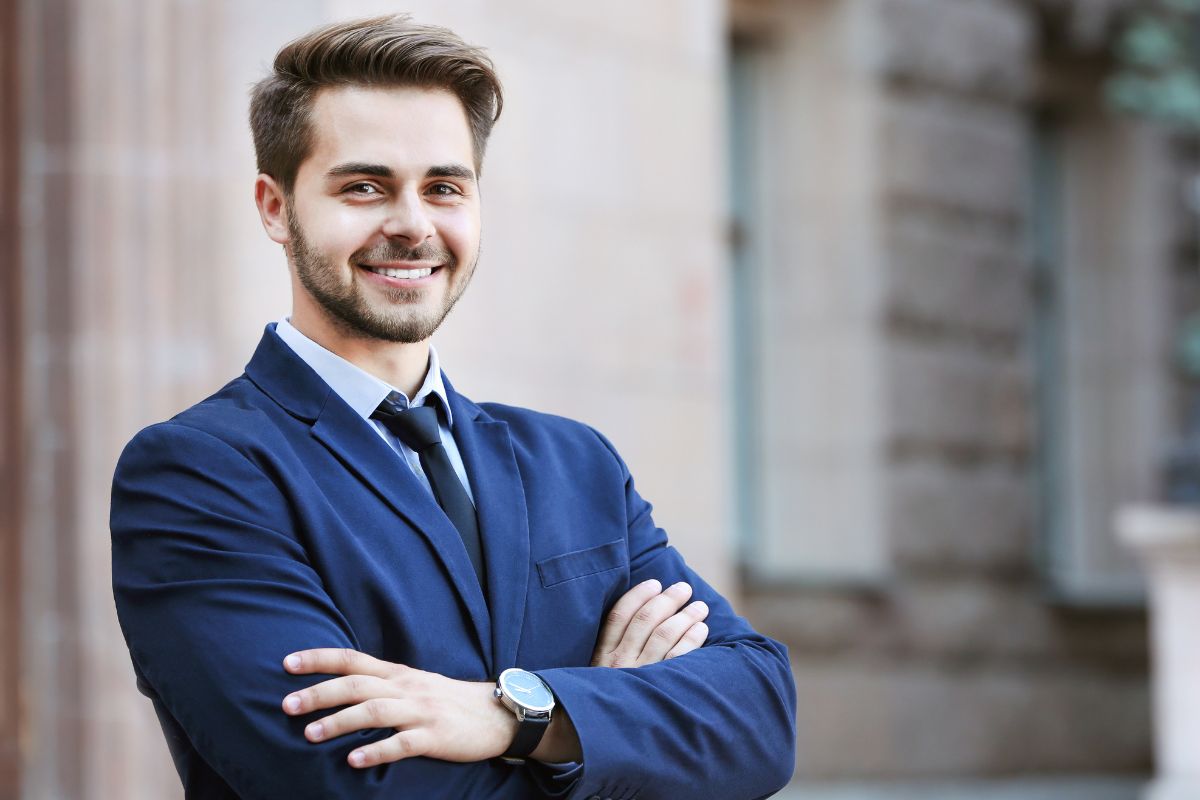 Photo of a man in a formal suit.