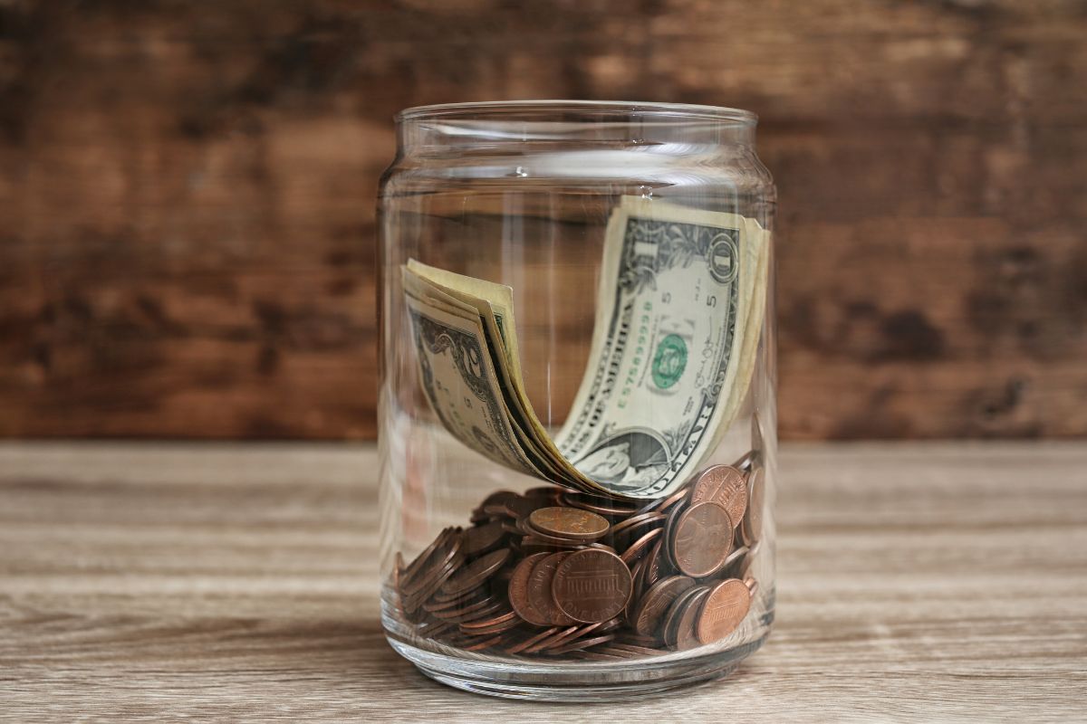 Picture of a jar with money.