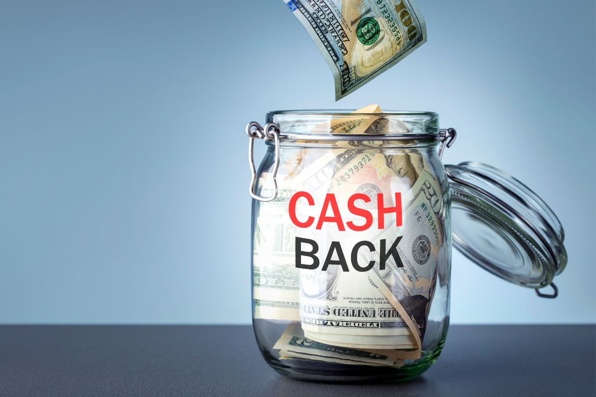 The photo shows a jar filled with dollar bills and with notes indicating that switching to cash-back for everyday purchases is an easy way to save without changing your habits.