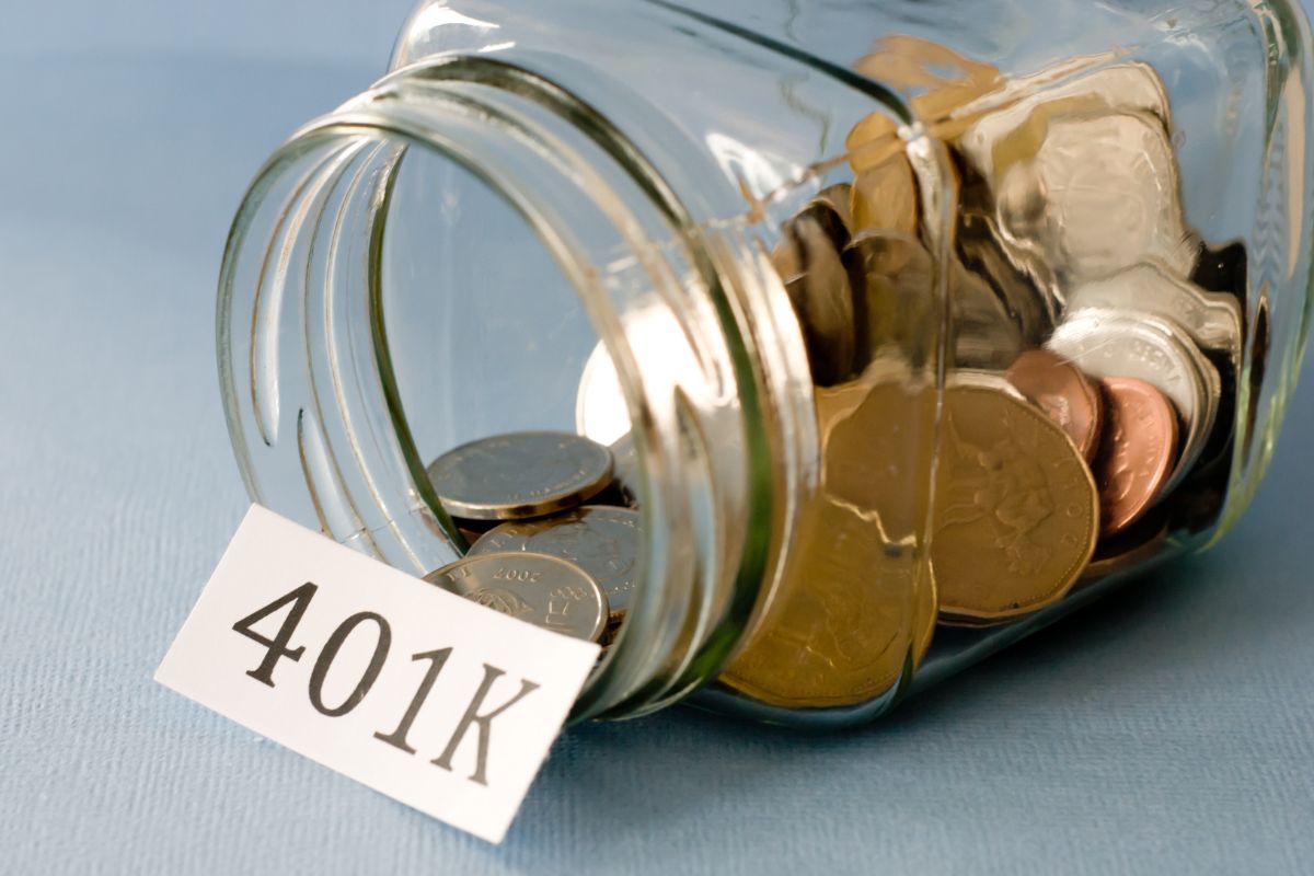 The image tells about a jar filled with coins and a piece of paper with a note indicating that max-out contributions to tax-advantaged retirement accounts can add up to big savings over time.