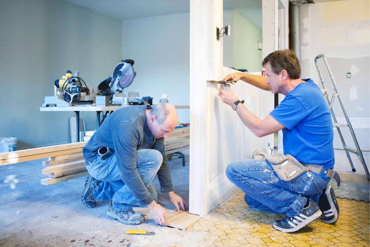 Picture of men doing home renovations.