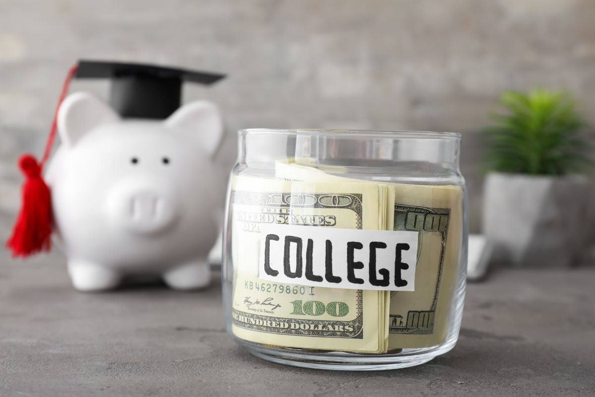 The image shows a piggy bank with a cap and a jar filled with dollar bills and a note indicating that using cash for paying college tuition helps avoid those fees and keep education costs lower.