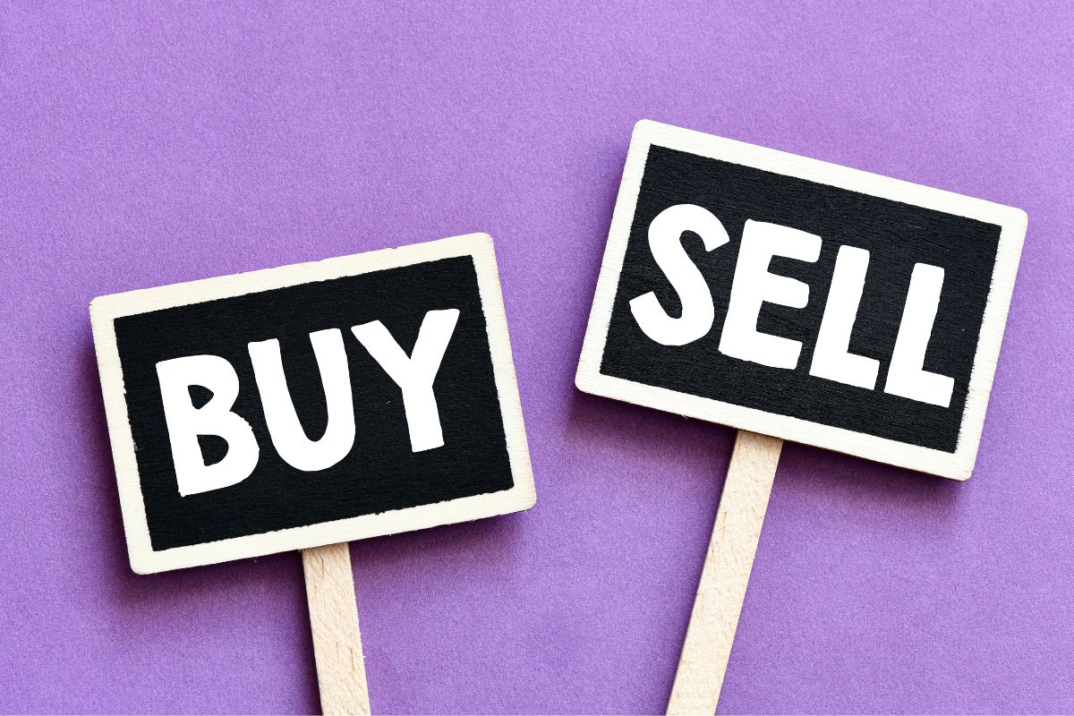 The image shows the board with notes referring to buying and reselling digital products is a smart way to make extra income from home with minimal effort after the initial setup.