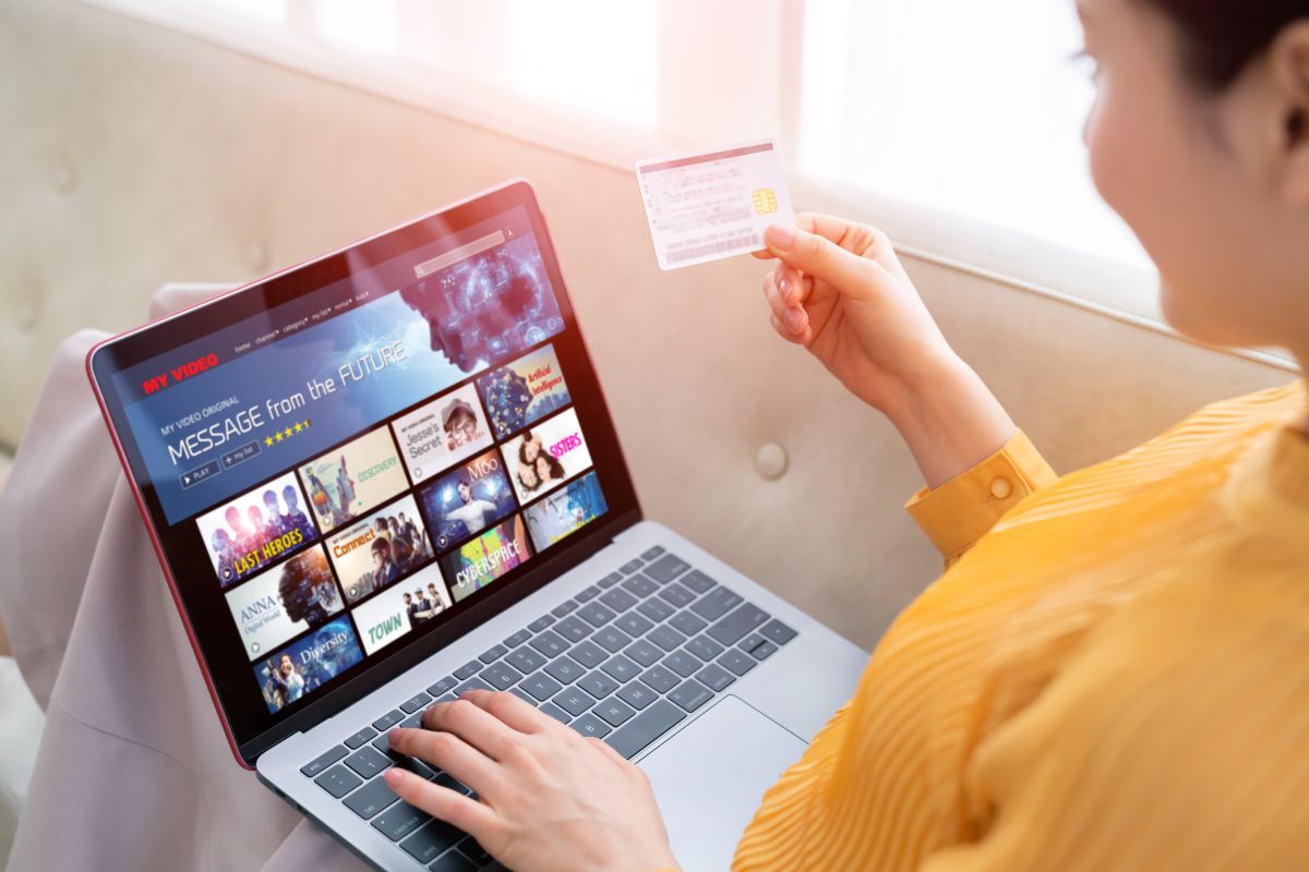 The photo shows a woman cancelling subscriptions.