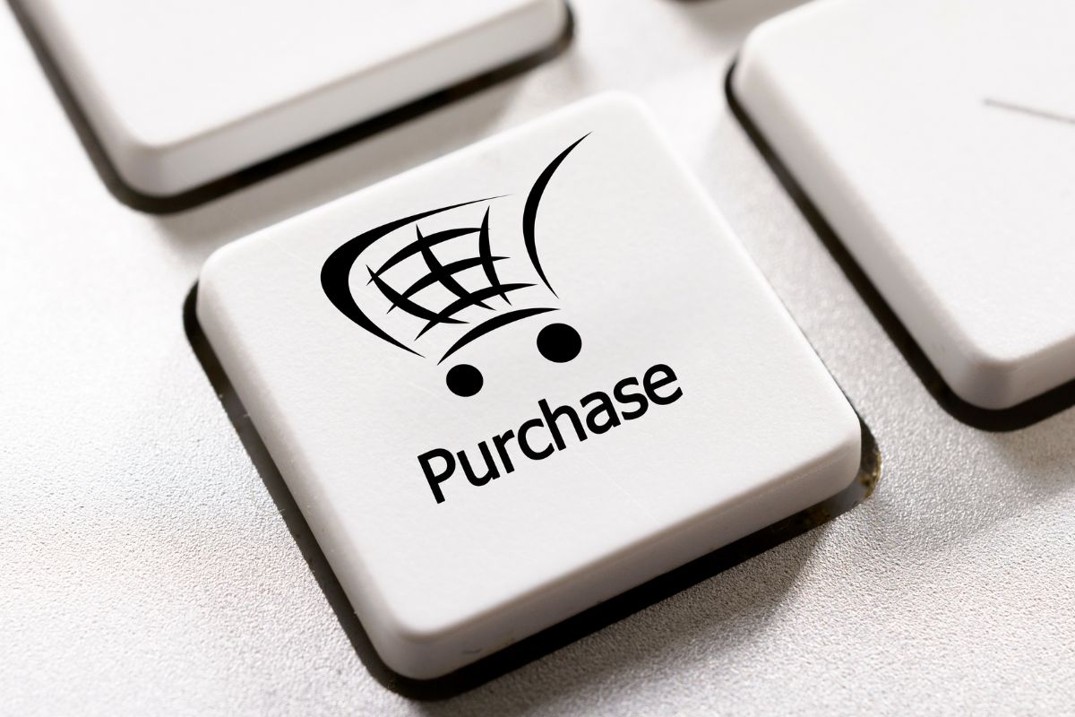 The image tells about the keyboard button with a cart graphic and a note indicating that setting a 48-hour rule for non-essential purchases keeps you from making impulse purchases that add over time.