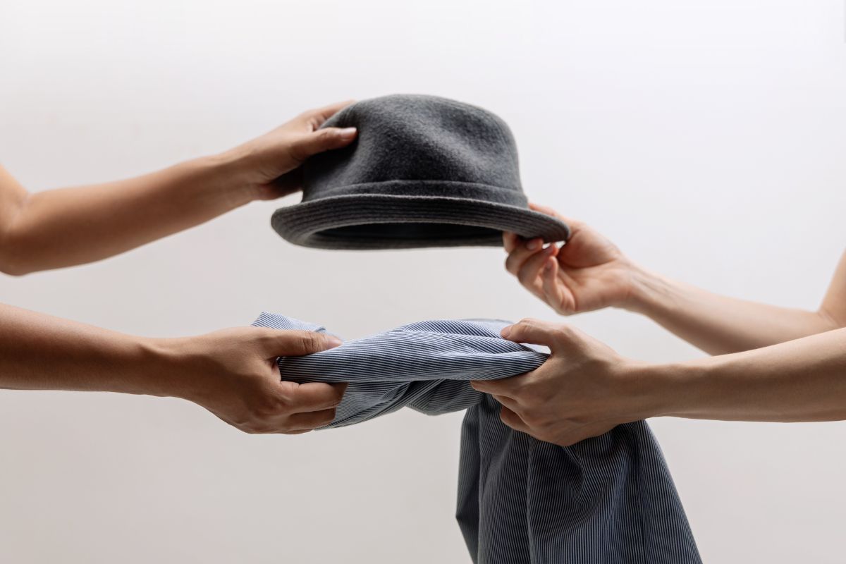 The photo shows women swapping stuff.