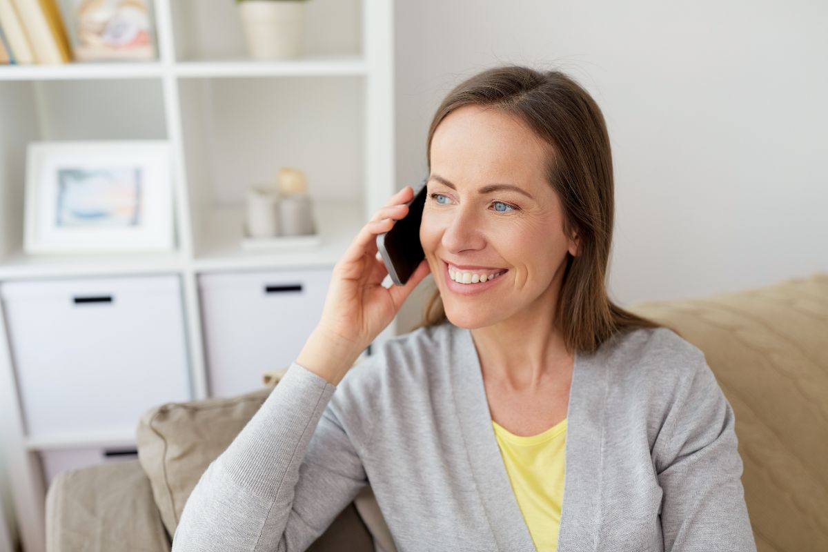 The image tells about a girl having a phone call which means to learn to negotiate everything is an easy way to improve your financial situation.