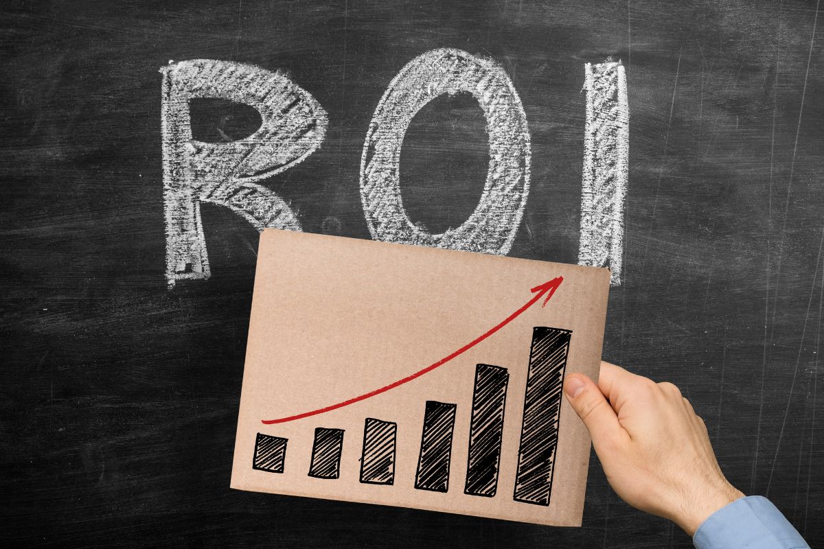 The photo shows a board with ROI wording and a graph.