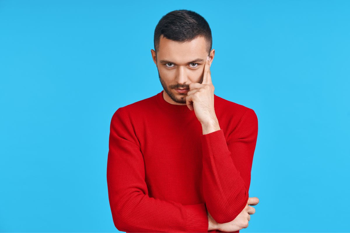 The picture shows a man thinking.