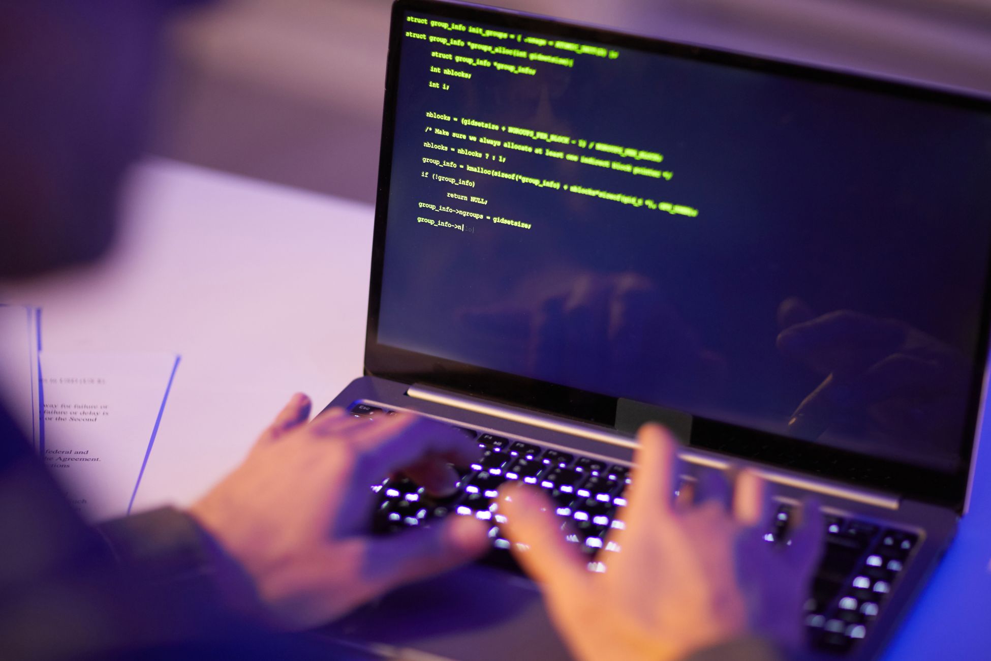 Image of a man coding.