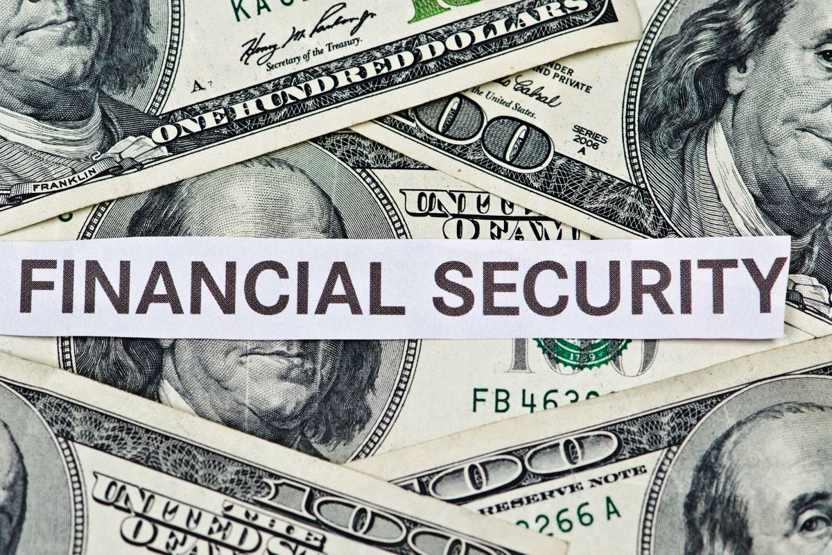 The image shows dollar bills with a piece of paper with a note which means associating savings with a strong emotional reason makes it less tempting to spend on things you don't need.