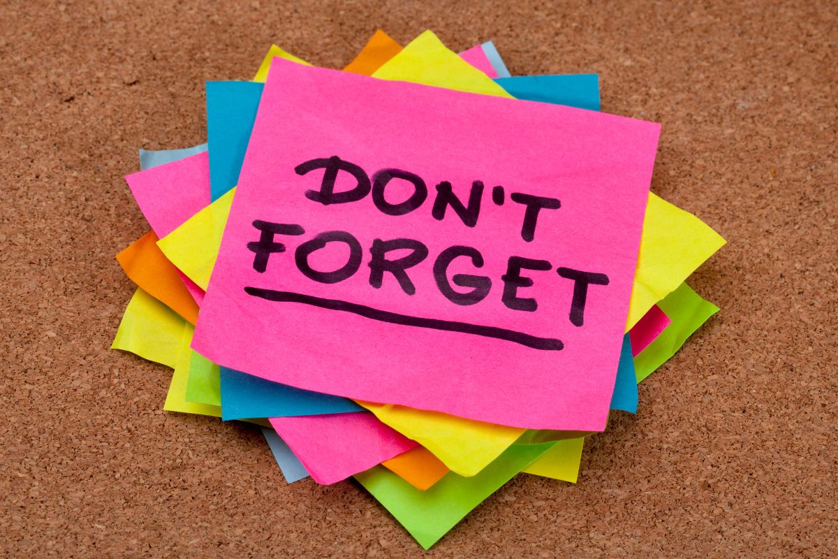 The image shows color papers with notes which refers to remind you of long-term goals making it easier to say no to wants you to remember what you're working toward.