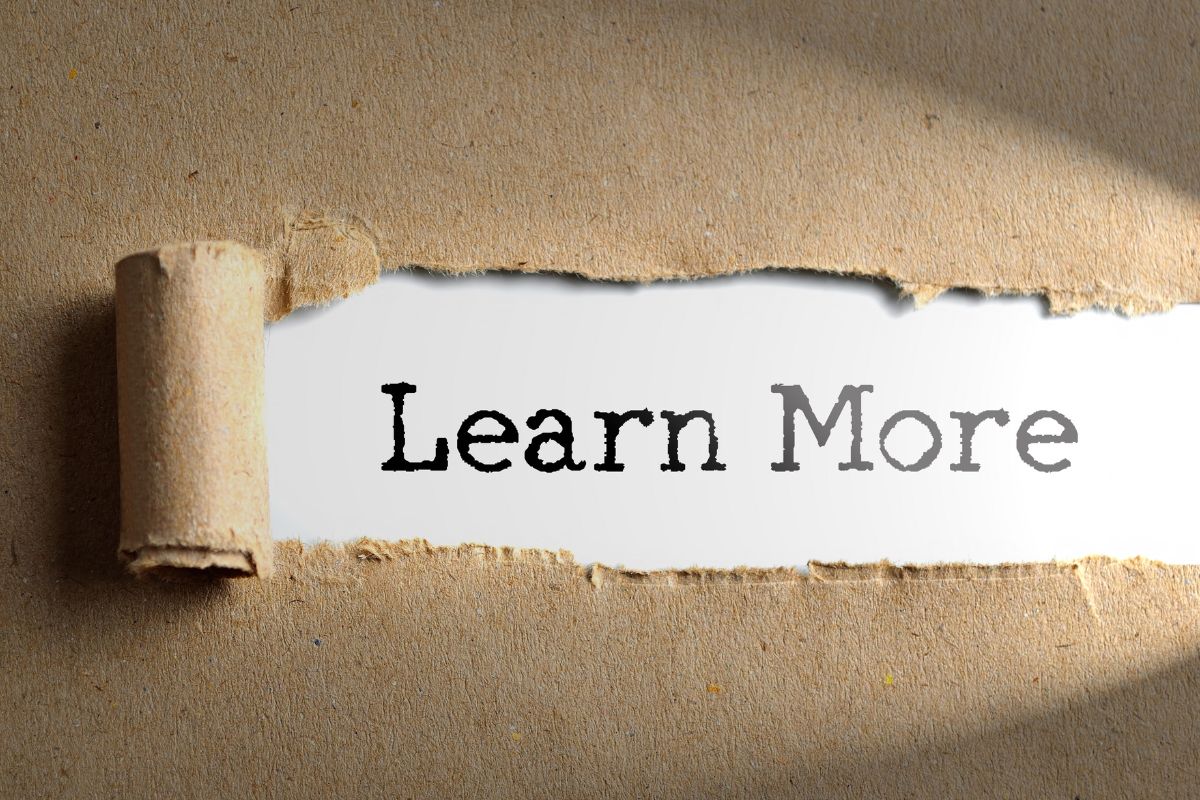 The image tells about a torn paper with notes referring to learning more about no-spend challenges to help you find what works best for you.
