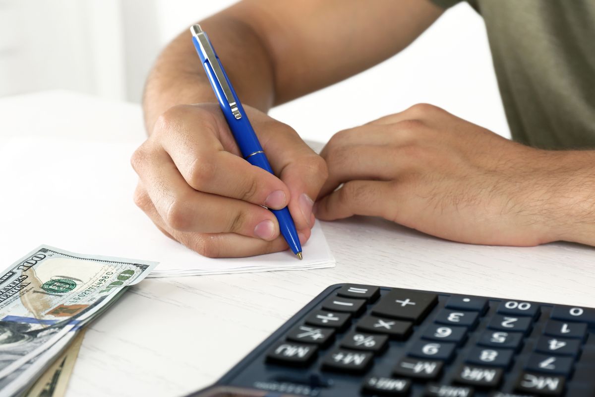 Image of a man budgeting.