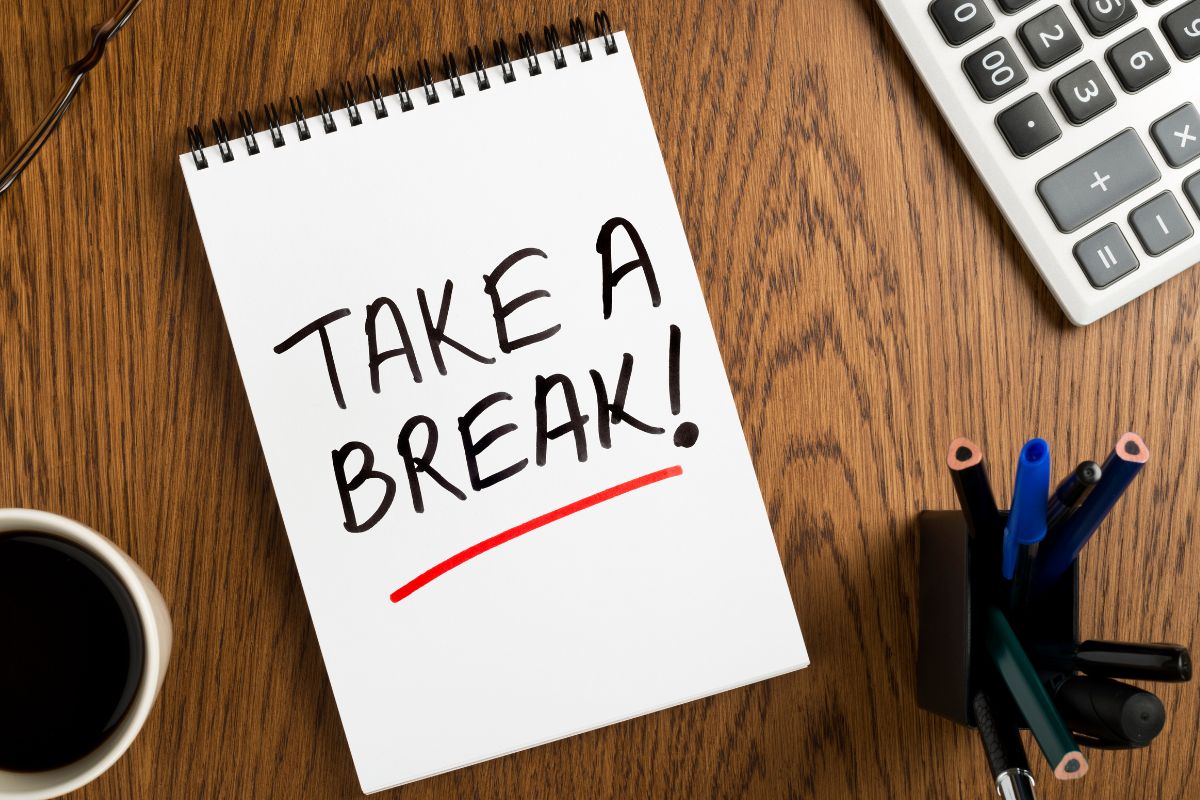 The photo shows a notebook with take a break written.