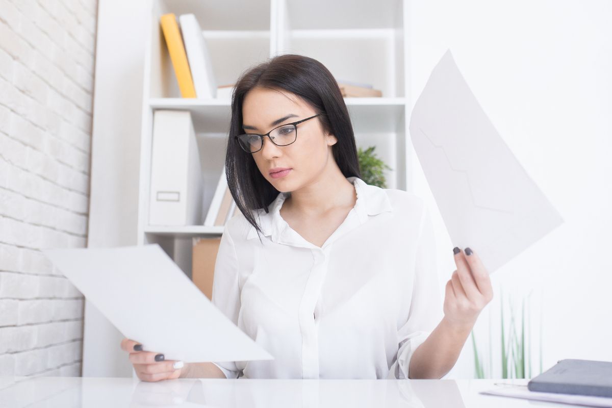 Picture of a woman analyzing trends and adjusting habits.
