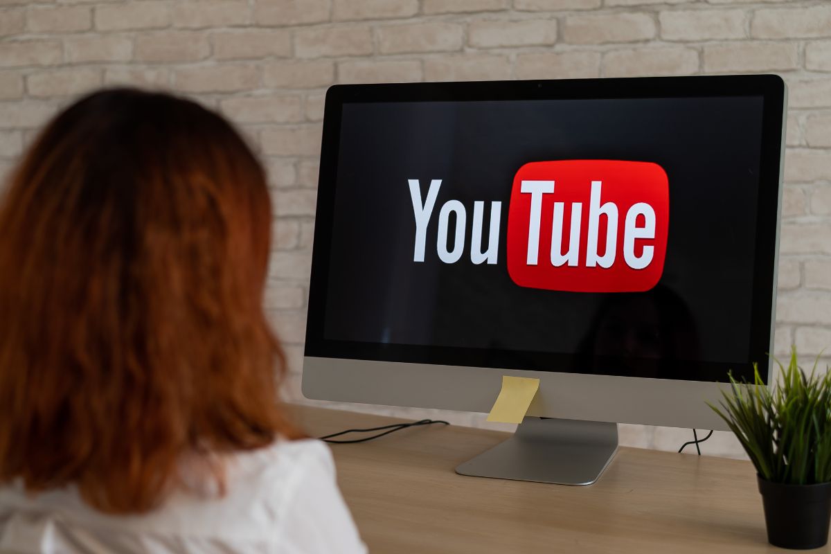 Photo of a woman creating a YouTube channel.