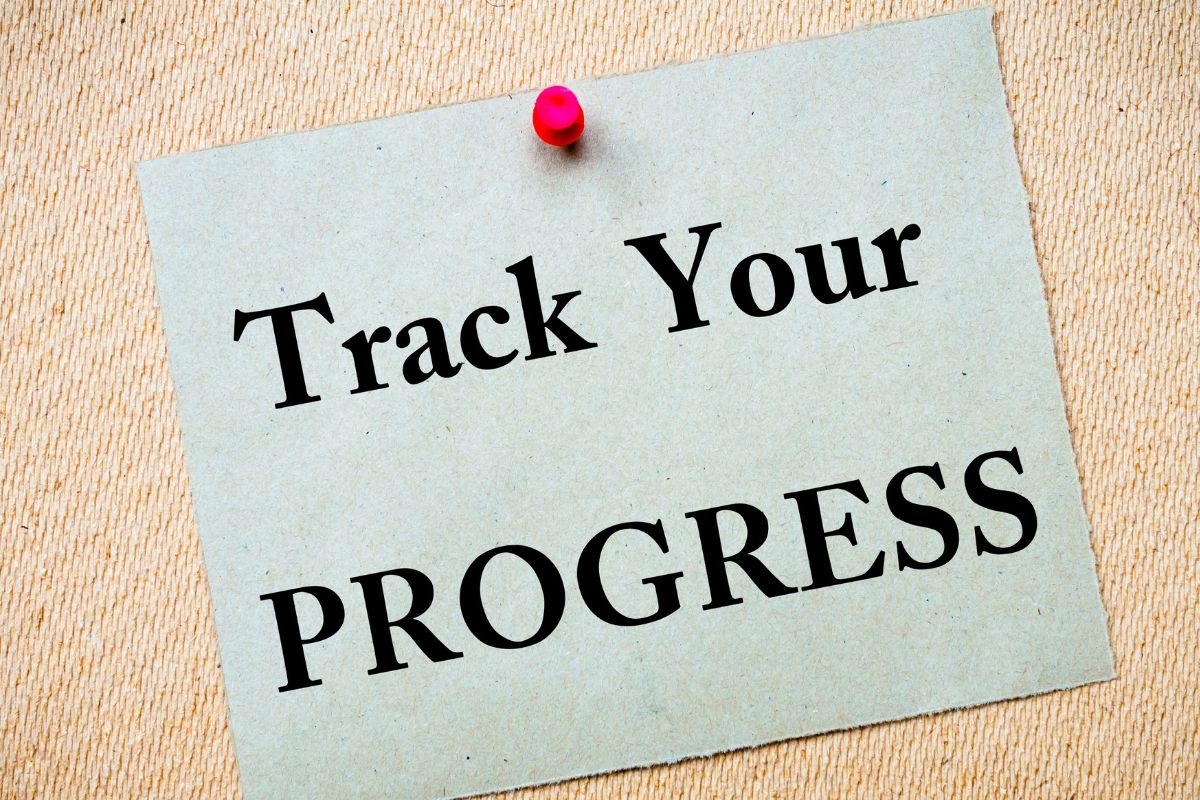 The image of a paper with Track your Progress working.