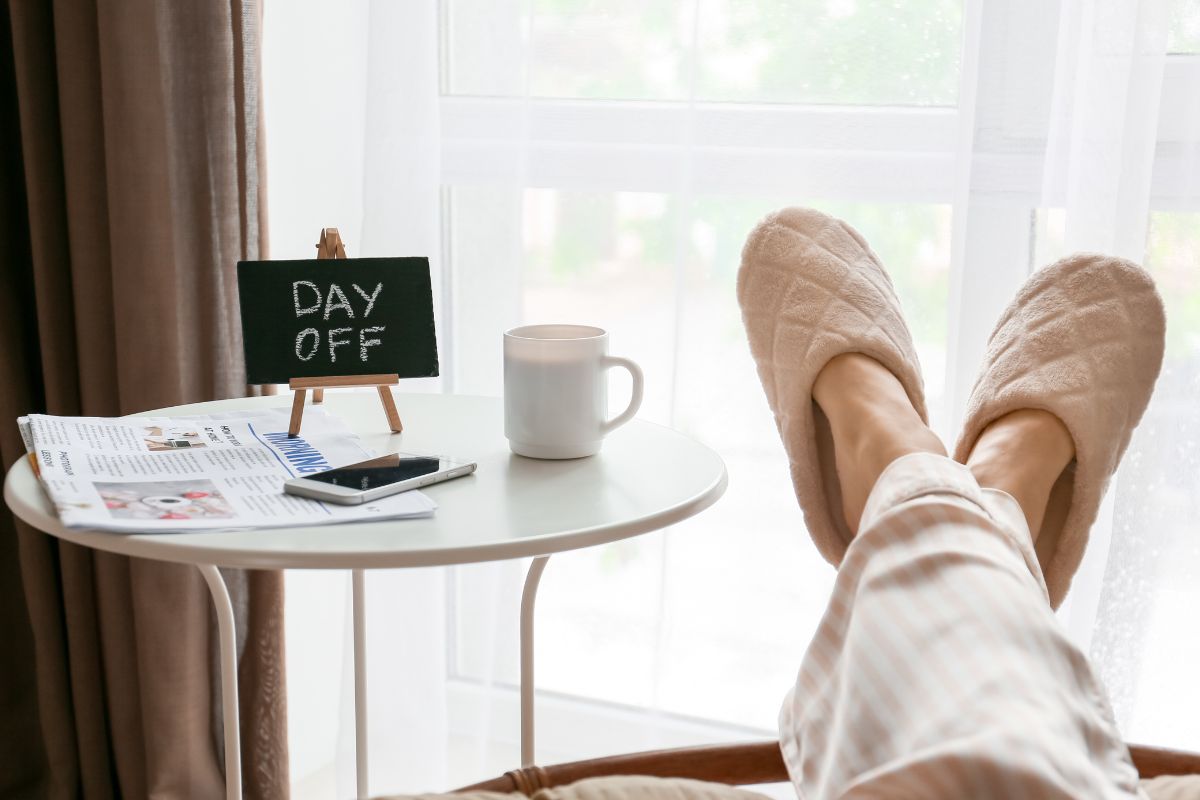 The photo shows a woman's foot resting on her day off.