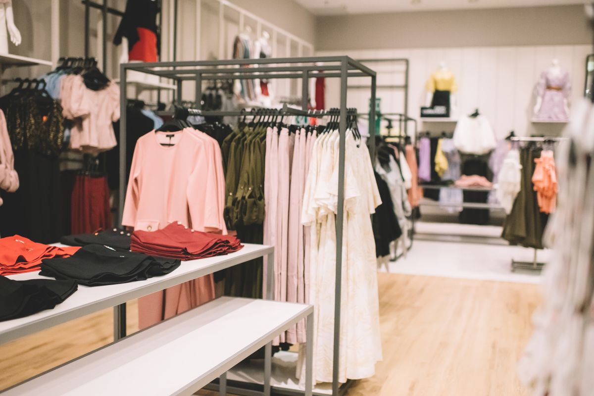 The picture shows clothes in the store.