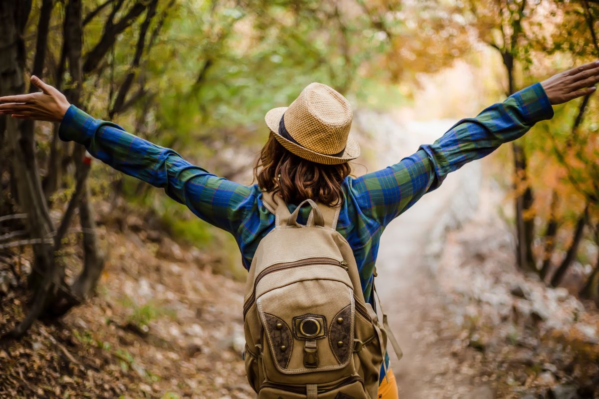 An image of a woman enjoying the tree view.