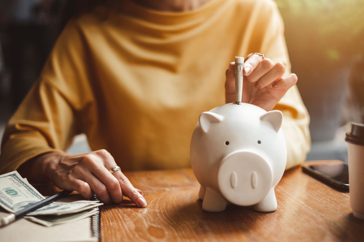Picture of a woman saving money.