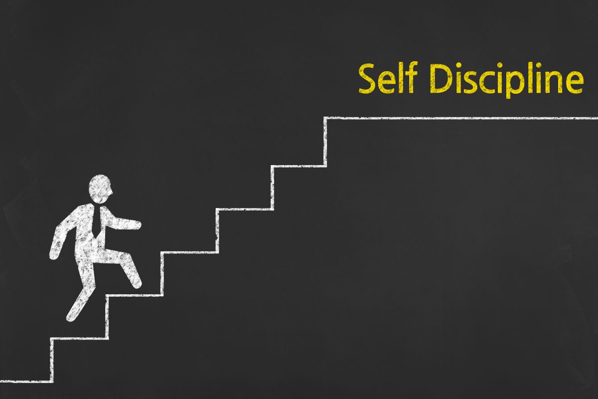 The photo shows a human drawing climbing the stairs towards a work at the top which means developing self-discipline to put in the work and stay focused.