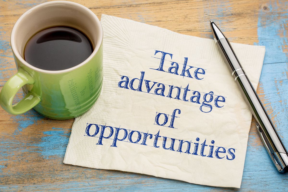 An image of a coffee and a paper with notes.