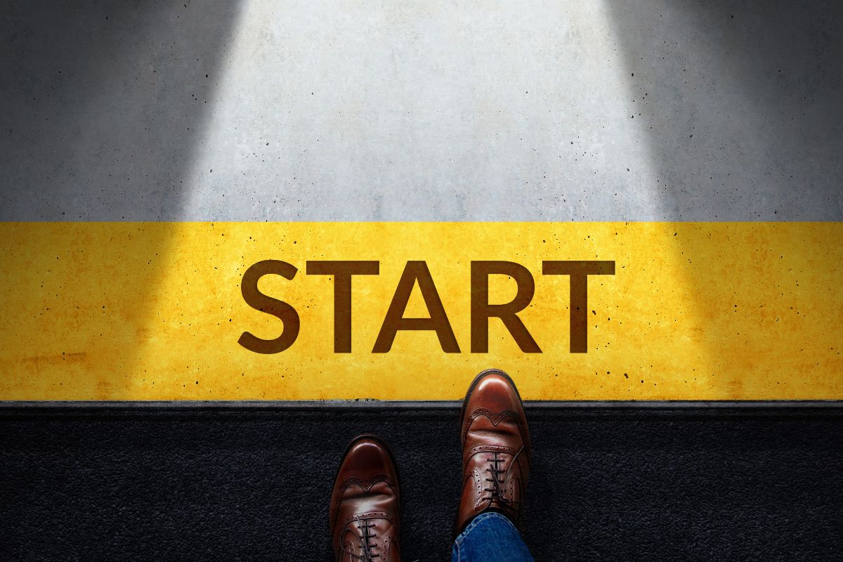 The image of a man's foot and the start wording.