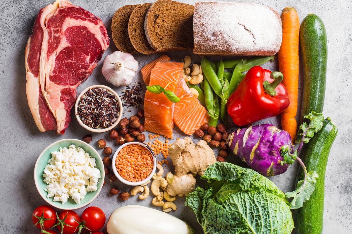 The picture shows meats, spices, and vegetables.