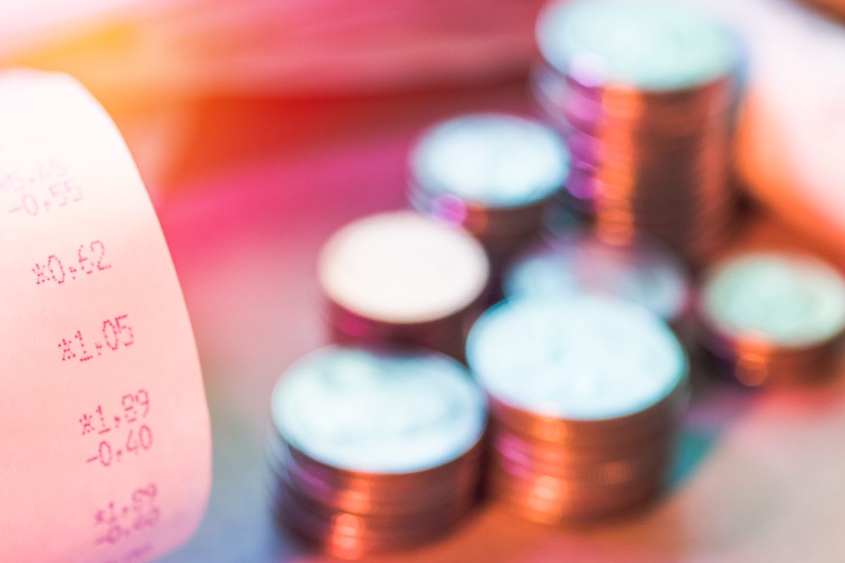 Photo of coins and a receipt for the round-up challenge.