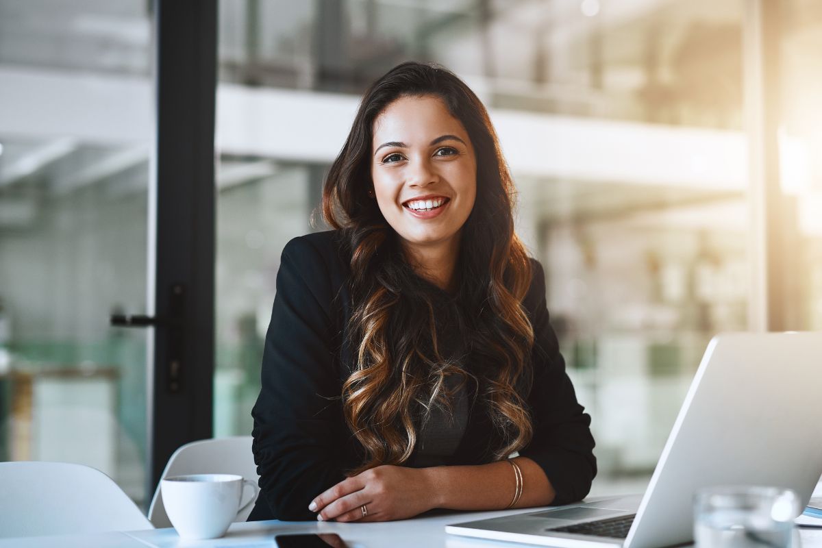 The image shows a woman working in a profitable industry.