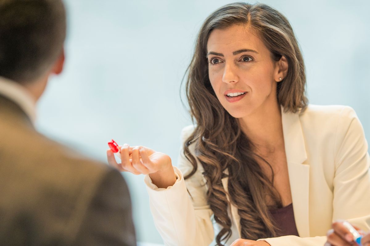 The photo of a woman negotiating.