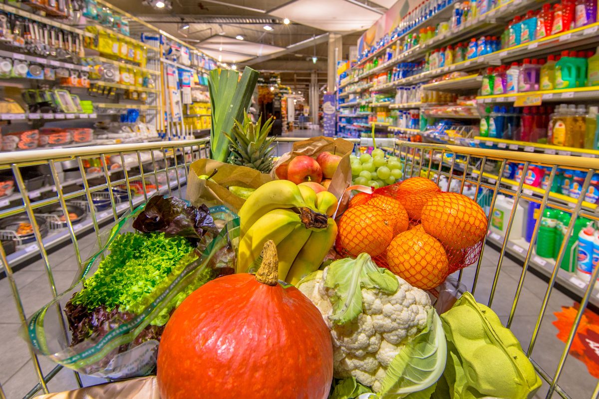 The photo shows a cart of groceries.