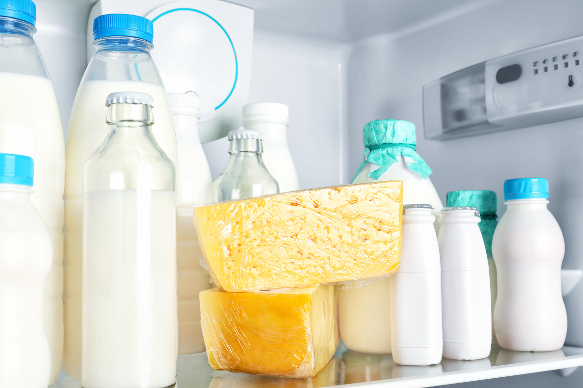 The picture of dairy products in a fridge.