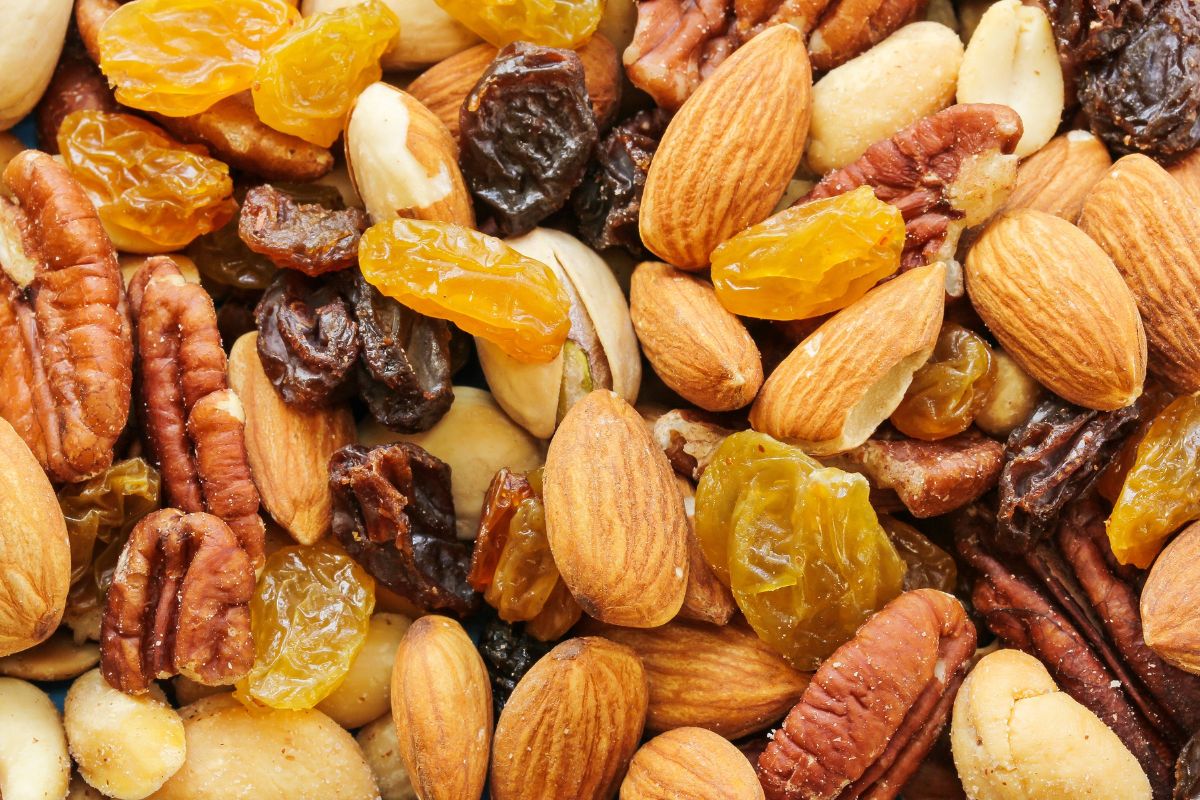 The image tells about dried fruits and nuts referring to dehydrating fruits and veggies help stretch grocery dollars and provide handy and shelf-stable snacks.
