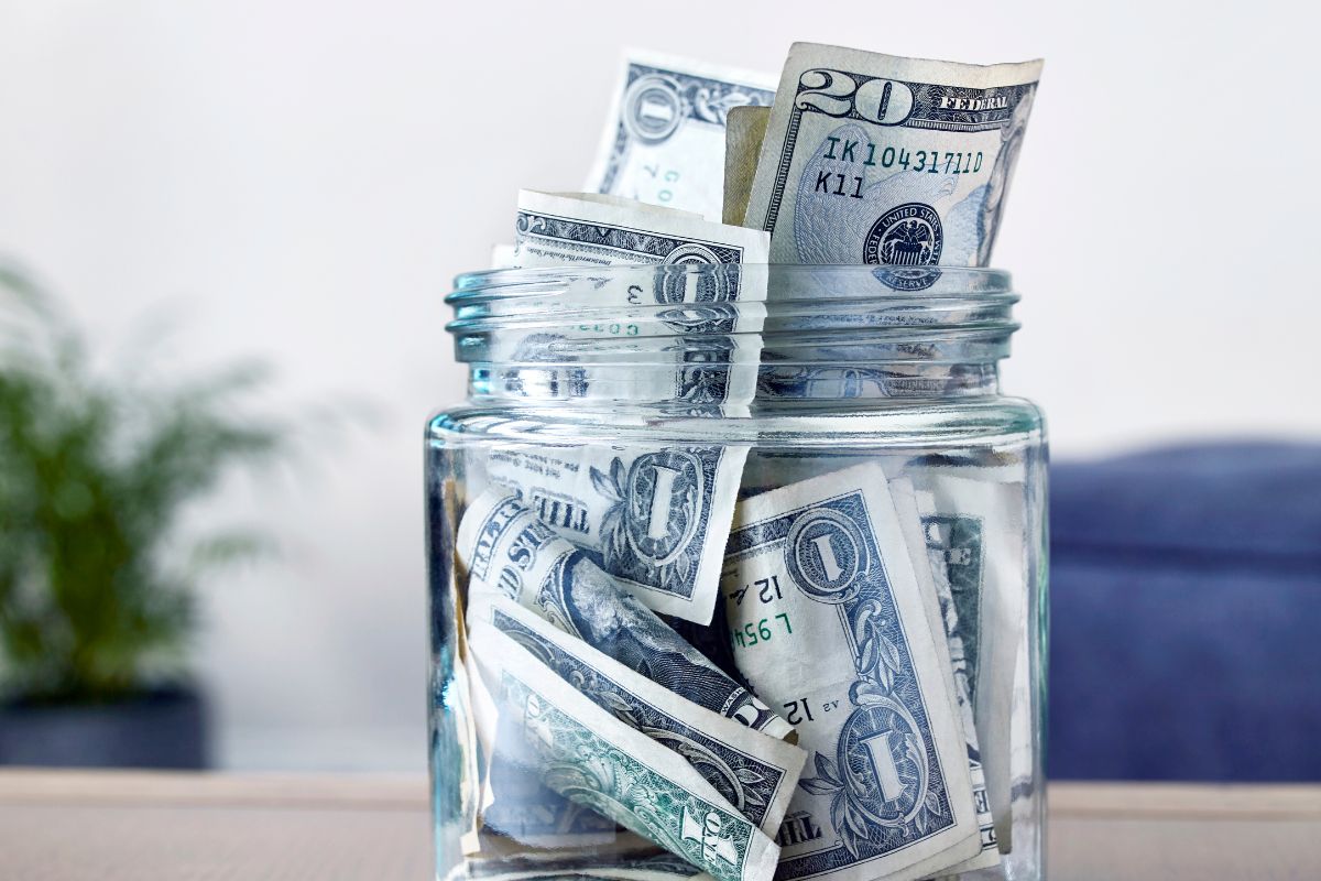 Photo of a jar with money.