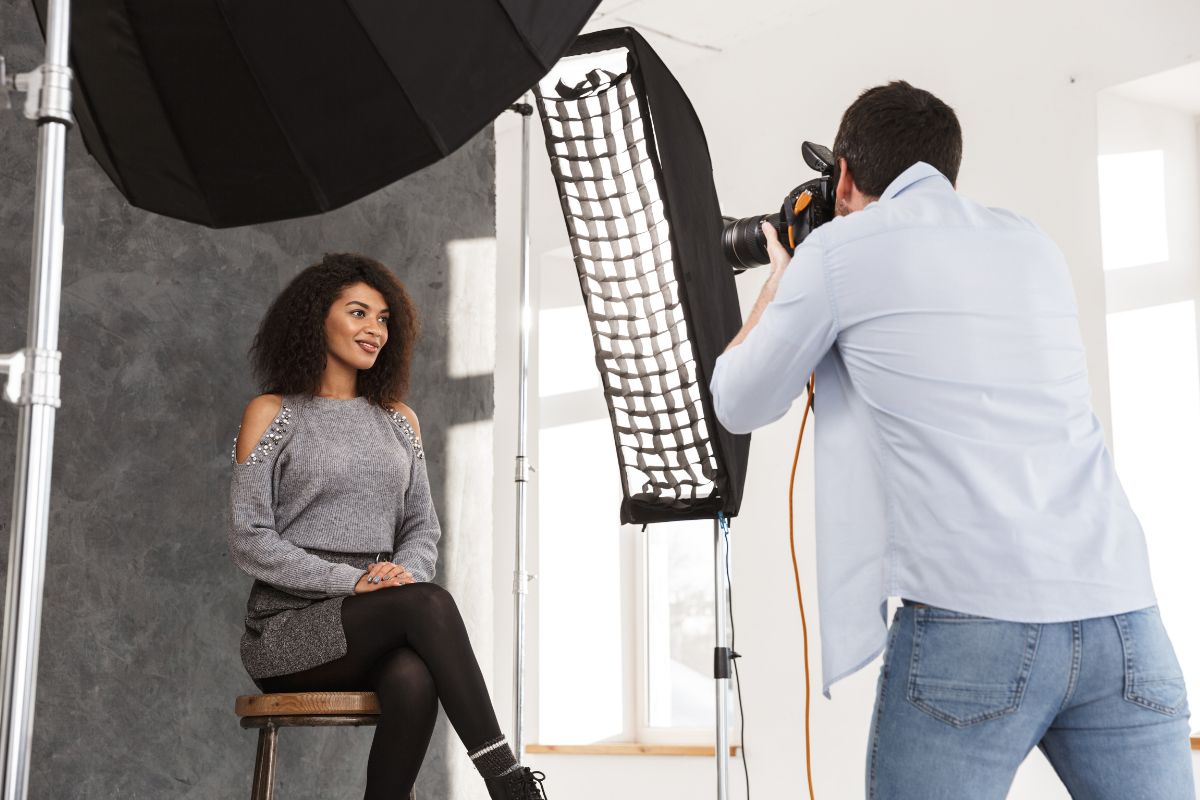 The picture shows tools, a model, and a man taking a picture of the girl which refers to learning new skills like photography provides the ability to monetize hobbies and is a great way to increase income.