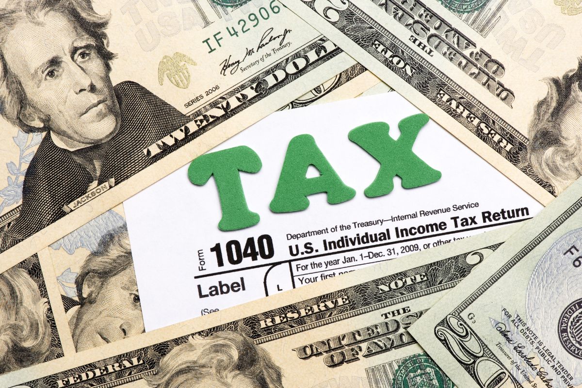 The photos show money and a tax form.